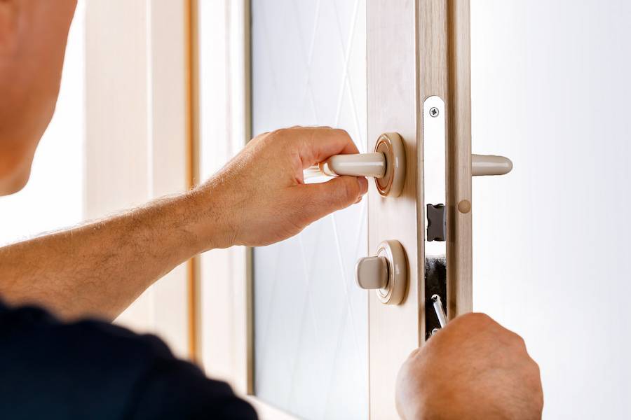 Installing a door lock in a white front door